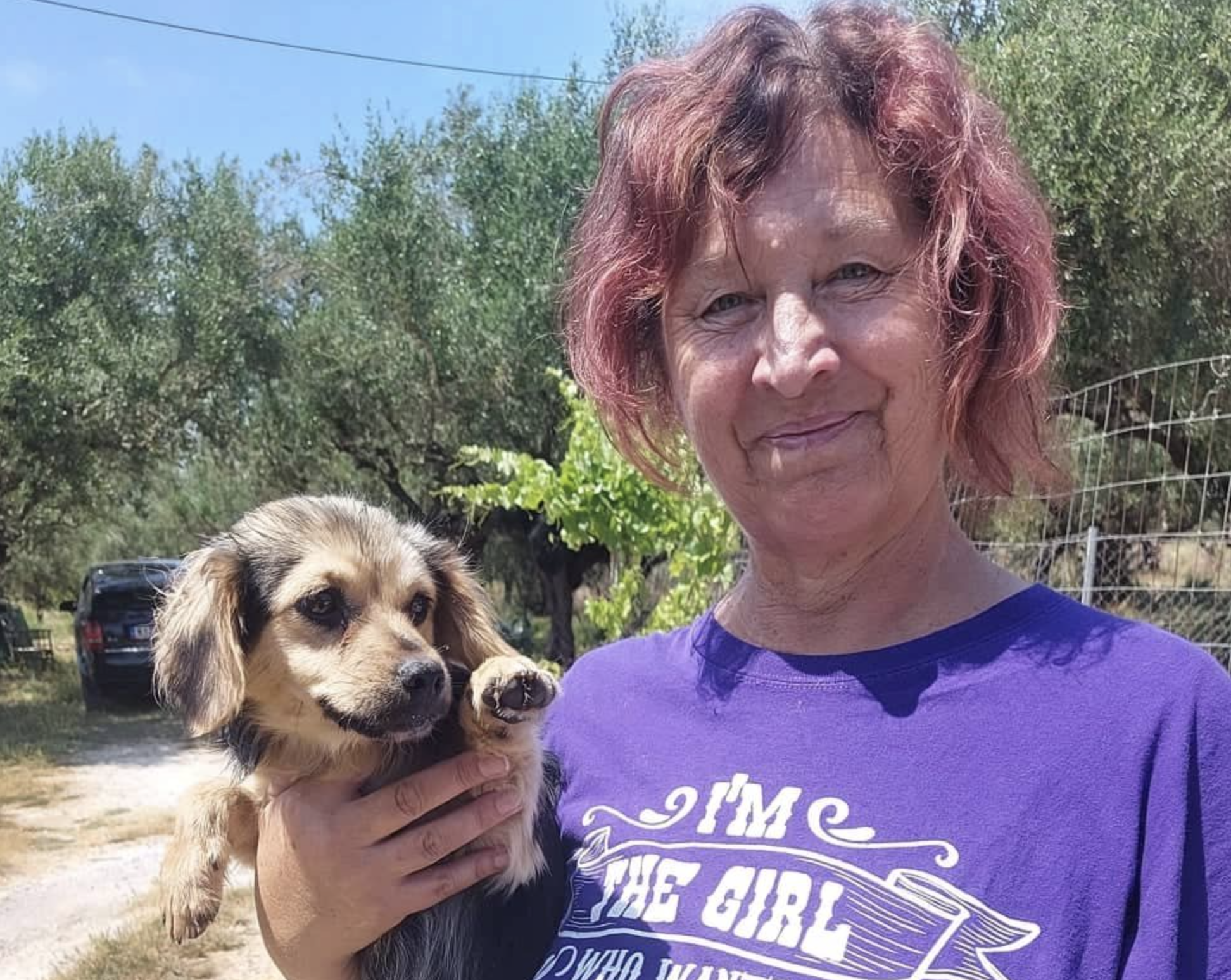 Healing Paws' Sue Deeth welcoming Zak and Tey to her shelter.