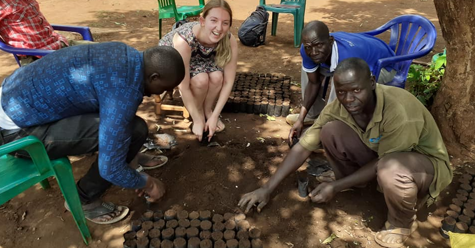 Holly, pictured above helping local communities with their planting schemes.